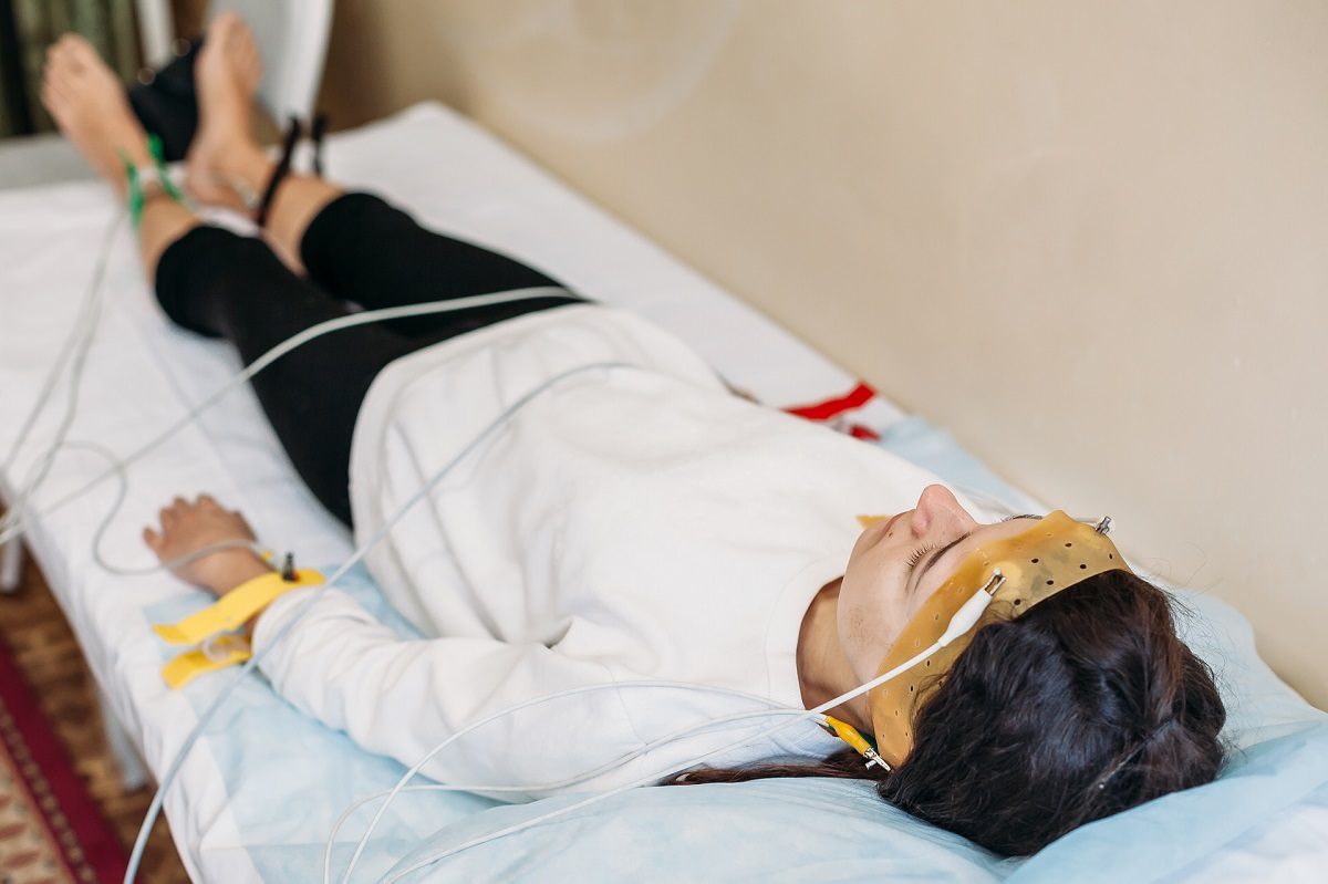 patient with encephalography electrode. medical examination Electroencephalogram studying the vascular system of the brain (EEG) Rheoencephalography